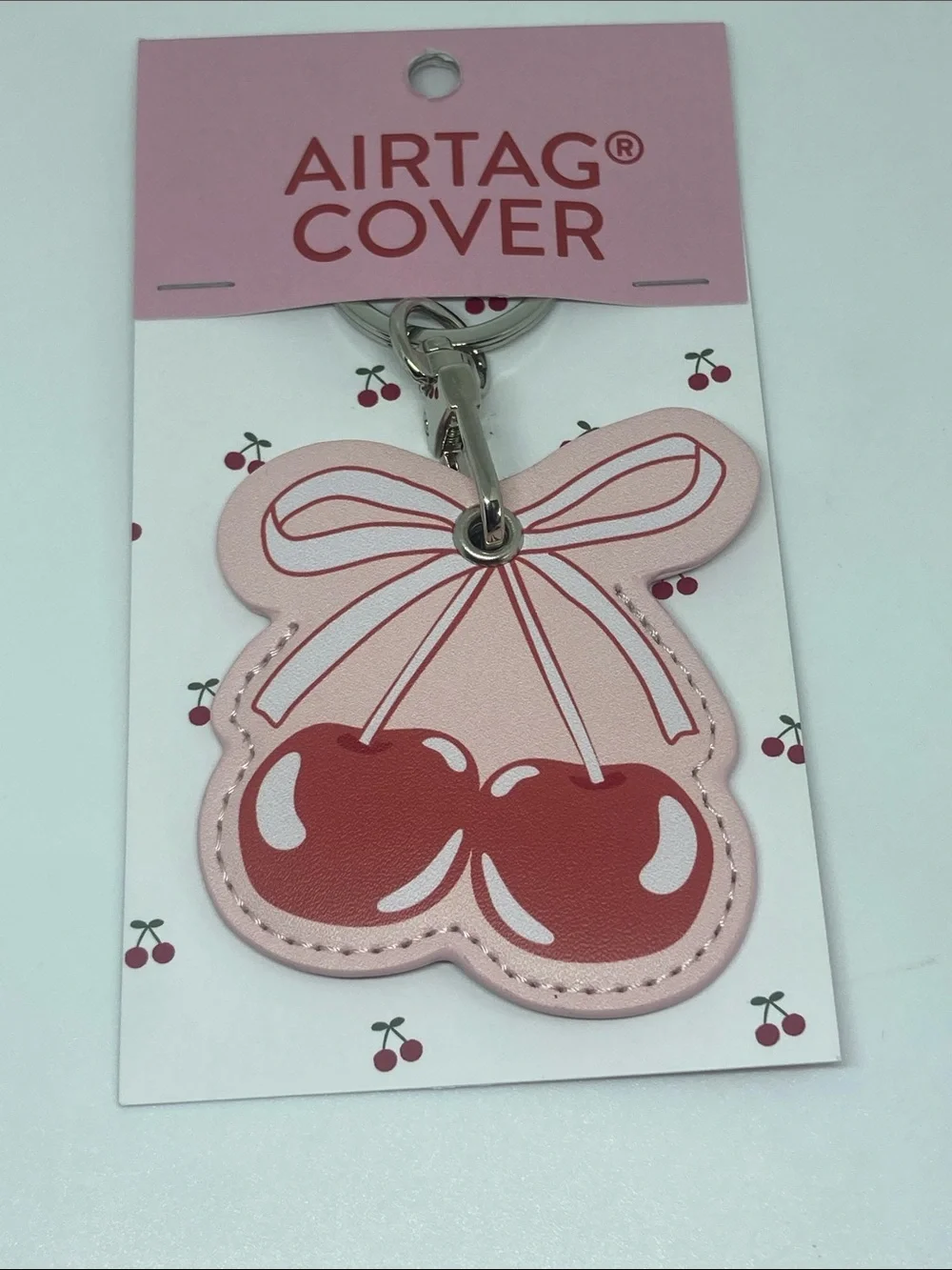 Tilly's Pink Cherry Airtag Cover Keychain